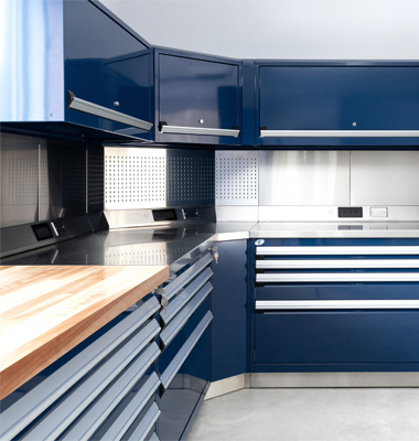 Modular industrial storage cabinets with drawers and overhead units for optimized workspace organization