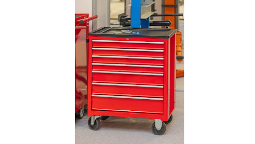 cart automotive service - Pedlex Industrial warehouse aisle with high-capacity shelving systems and safety cone for aisle clearance